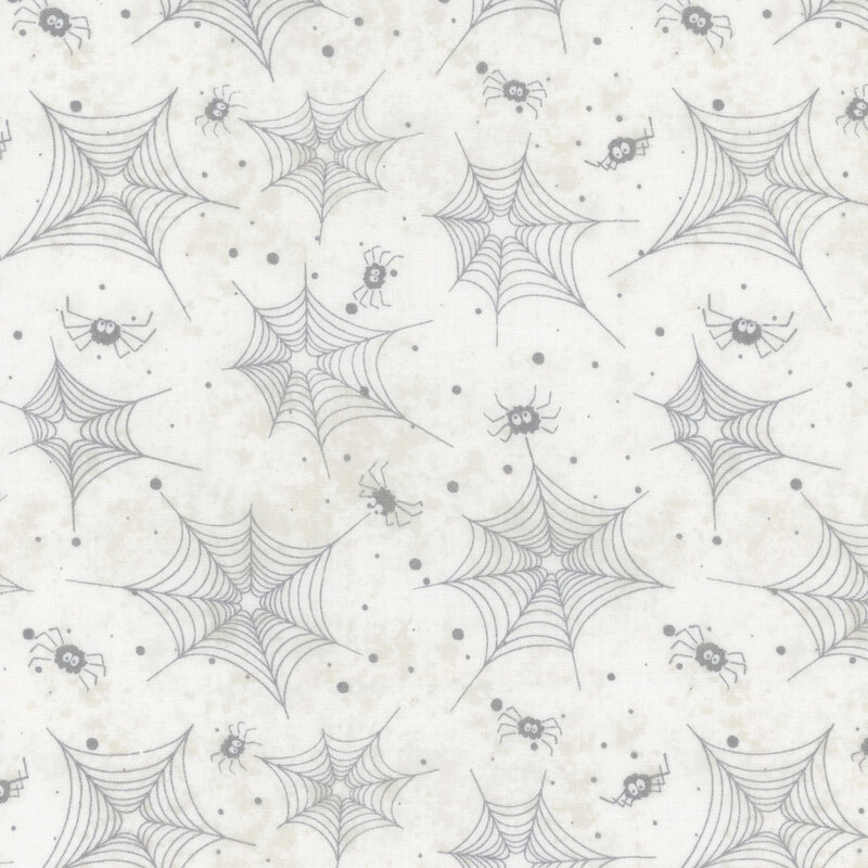 White fabric with gray spider webs, dots, and spiders all over