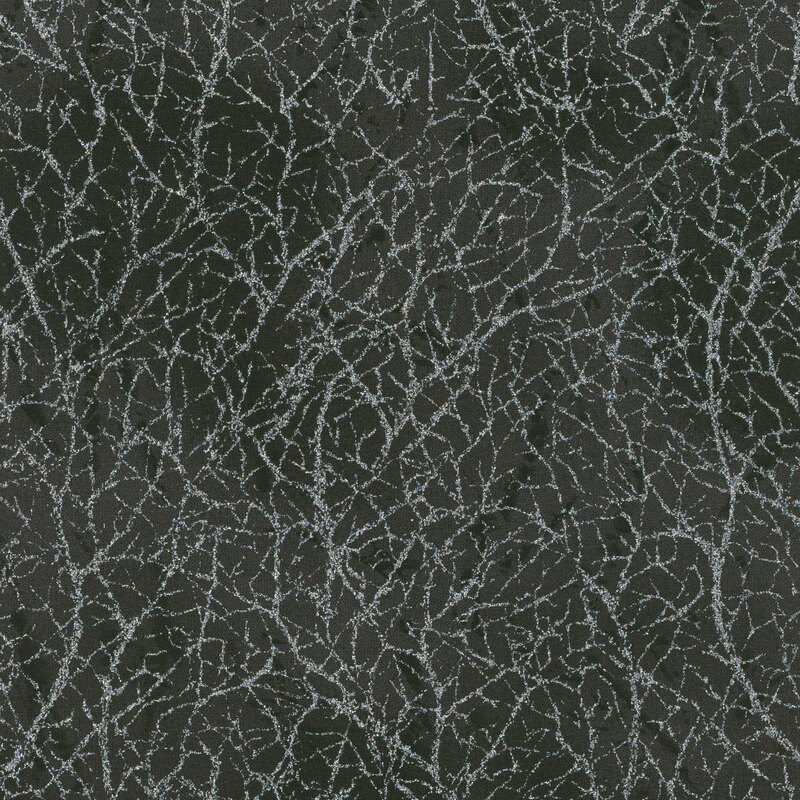 Black mottled fabric with silver glitter in a pattern that mimics cracks or webs