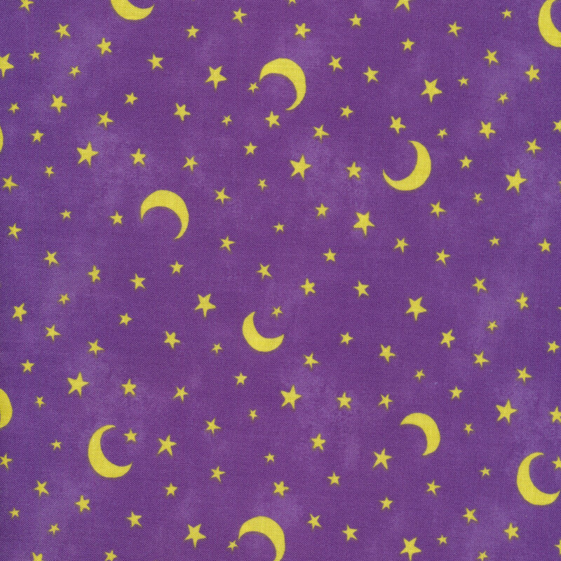 Purple fabric with yellow stars and crescent moons all over