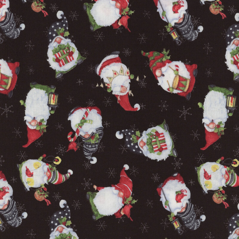 Black Christmas fabric with tossed winter gnomes and small white snowflakes all over