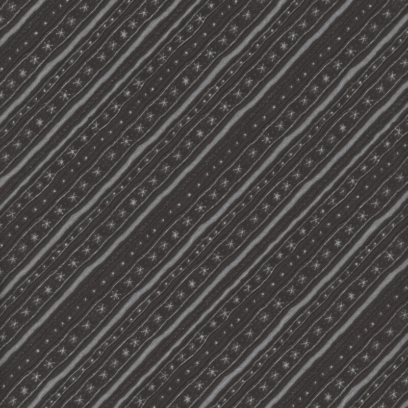 Black tonal fabric with charcoal bias stripes with small dots and snowflakes