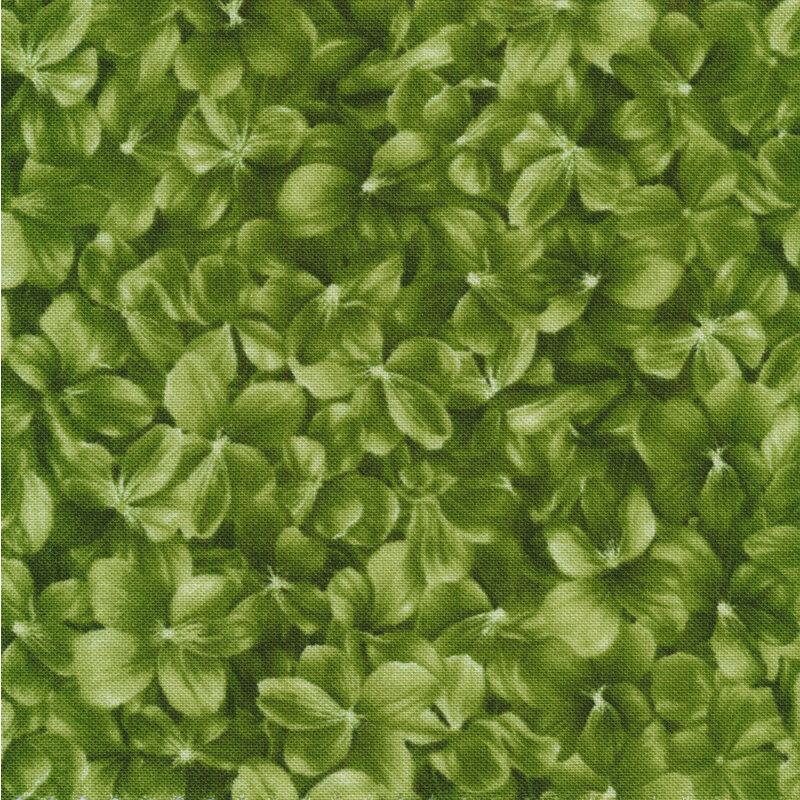 Scan of fabric featuring packed bright green flowery print