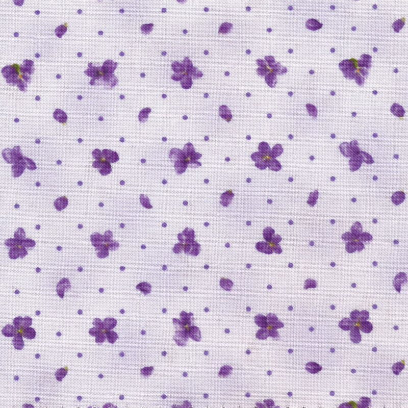 Scan of fabric featuring small purple flowers and polka dots on a light purple background