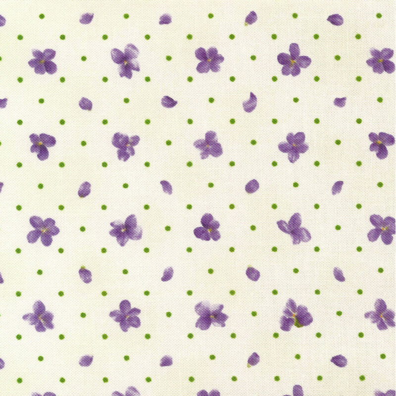 Scan of fabric featuring small purple flowers and polka dots on a bright white background