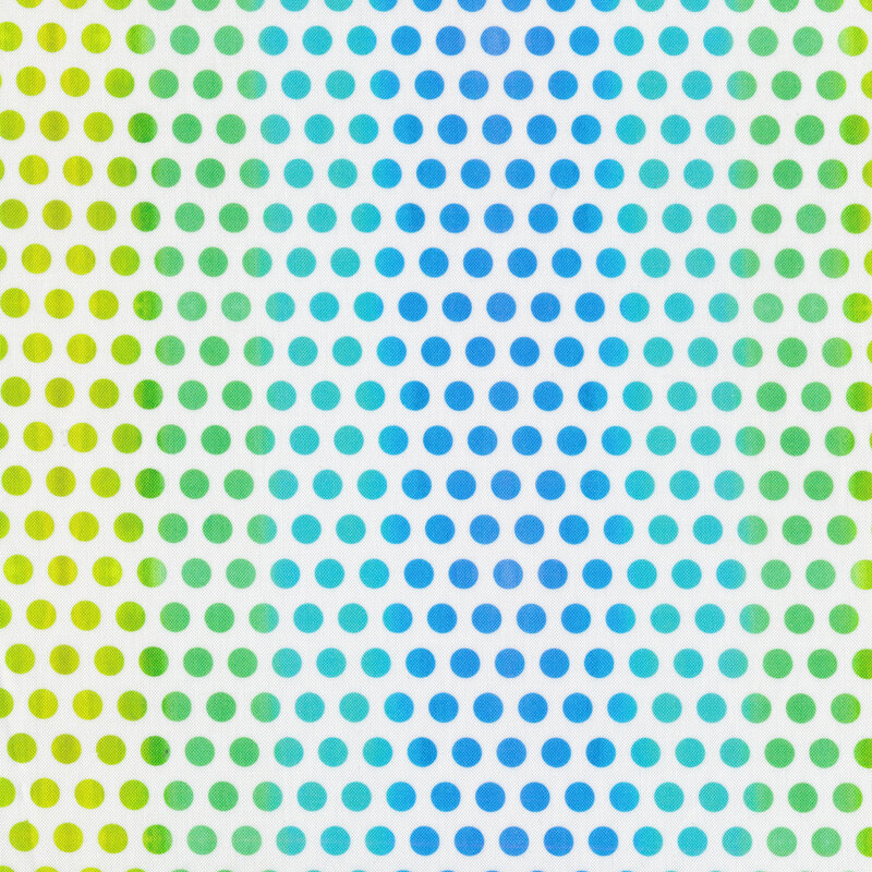 Fabric with bright blue, green, and yellow polka dots all over a white background