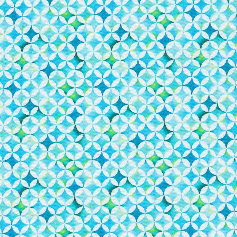 Fabric with teal, aqua, and green tiled stars all over a white background