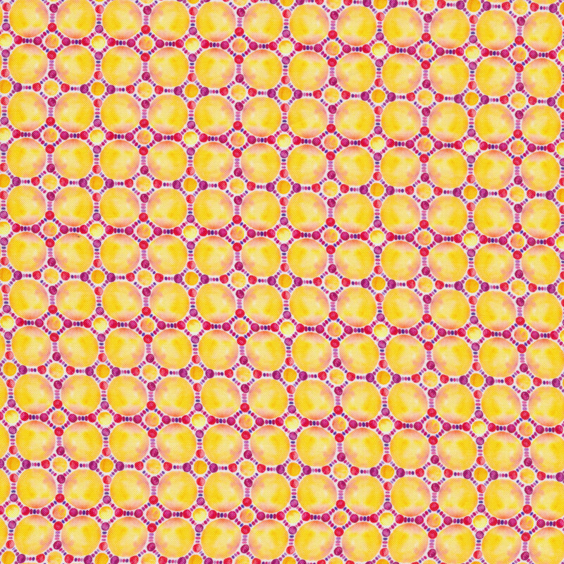 Fabric with circular yellow suns all over with pink and purple circular outlines