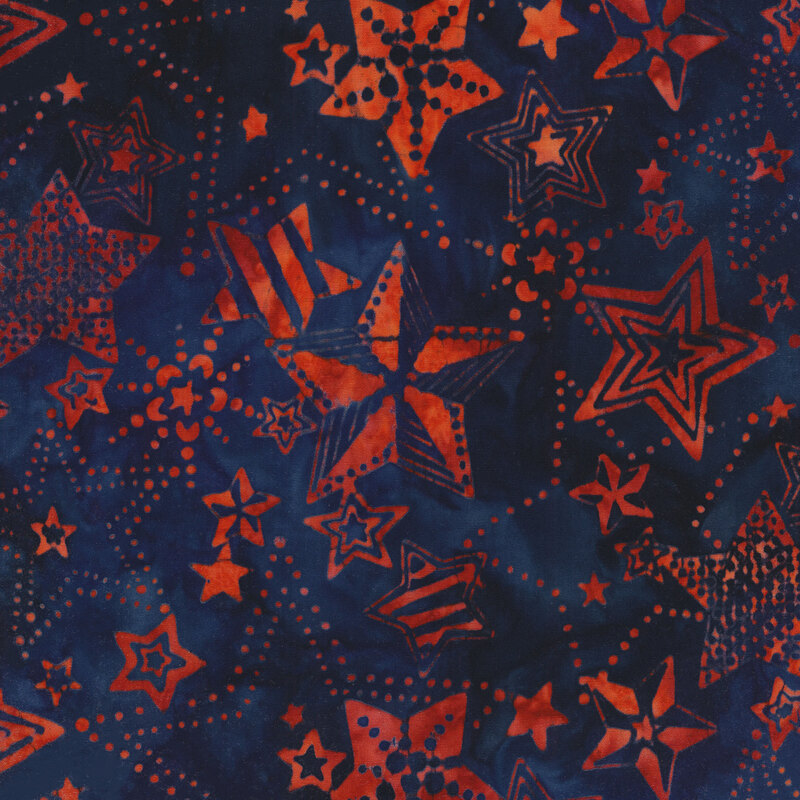 Navy blue mottled fabric with red mottled stars in different styles and patterns all over