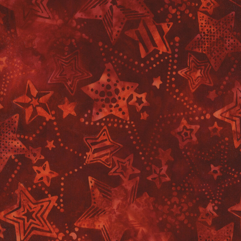 red mottled fabric with tonal red mottled stars in different styles and patterns all over