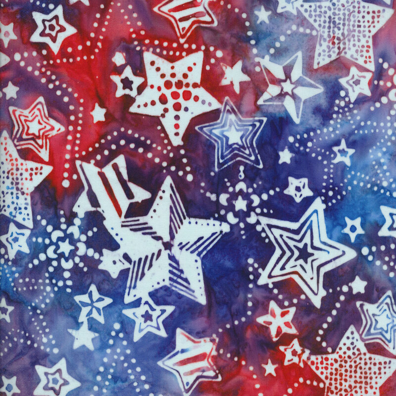 blue and red mottled fabric with tonal white stars in different styles and patterns all over