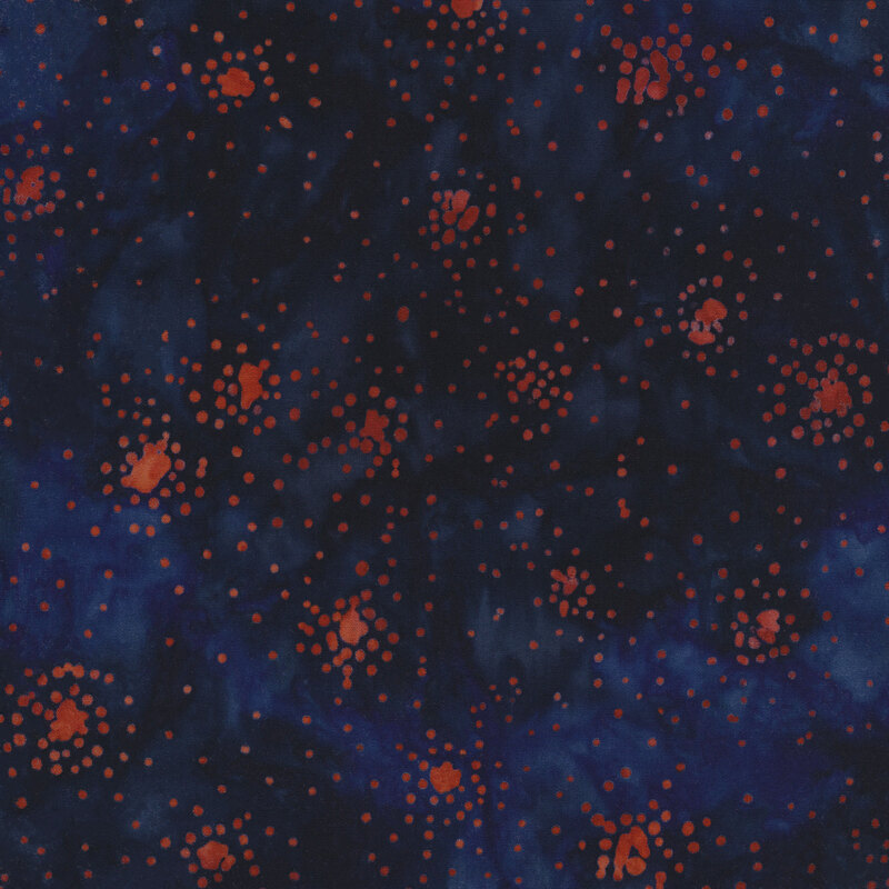 Mottled dark blue fabric with red dot clusters