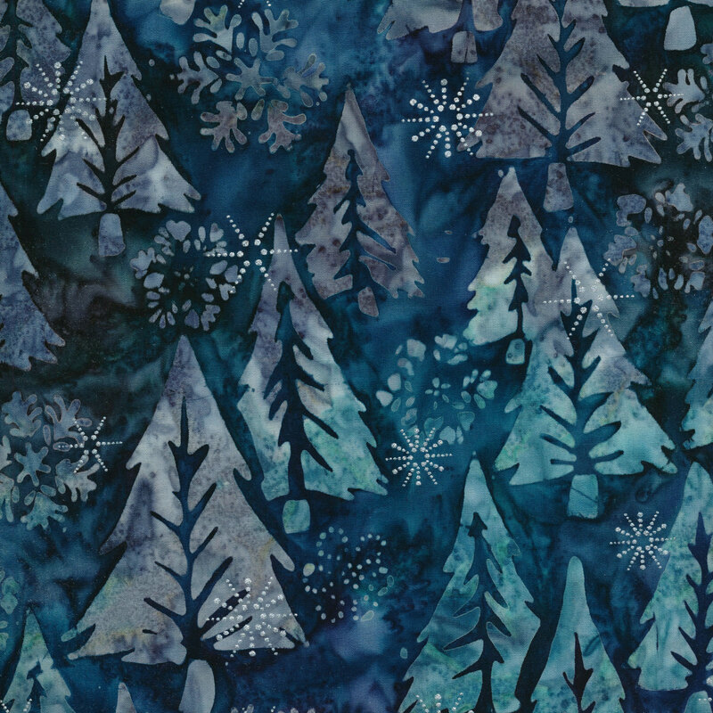 Blue marbled batik fabric with large pine trees and snowflakes with silver metallic accents