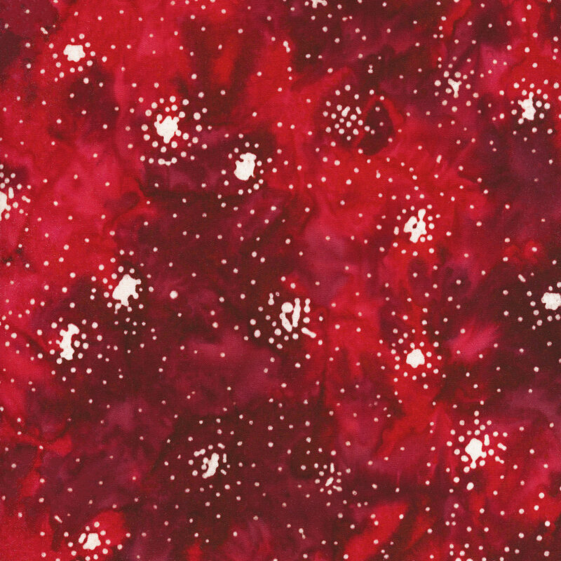 Mottled red fabric with white dot clusters