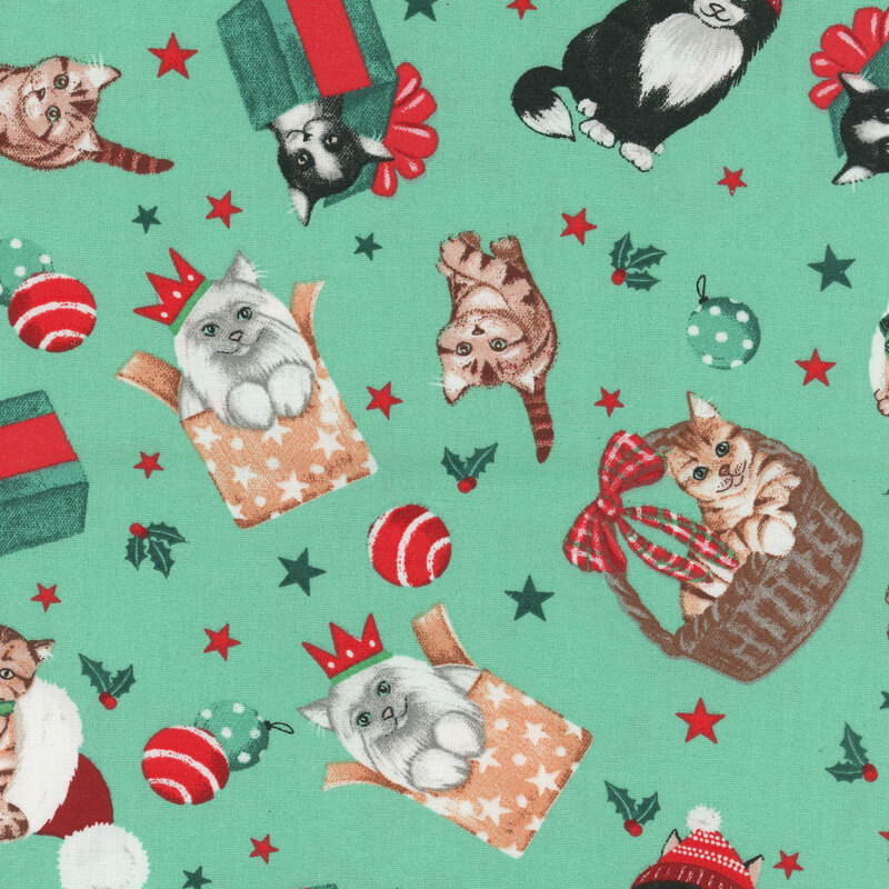 Solid mint green fabric with stars, ornaments, and winter cats wearing hats, sitting in baskets, stockings, and boxes
