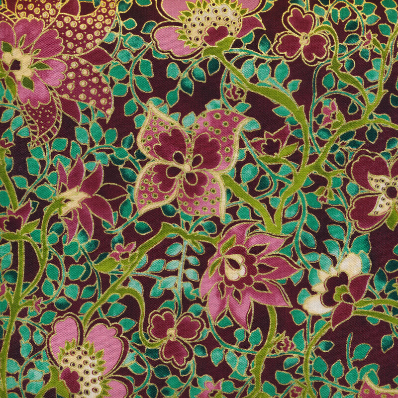 Purple fabric covered with teal and green leaves and vines with light purple/pink flowers