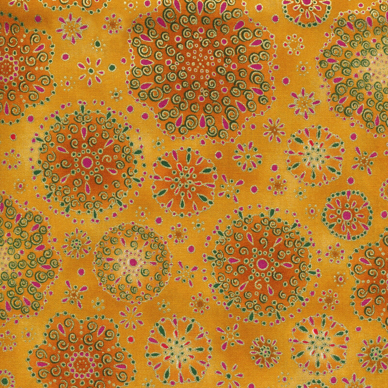 Yellow fabric with ornate flower shapes in varying sizes and shades of orange with gold and pink accents
