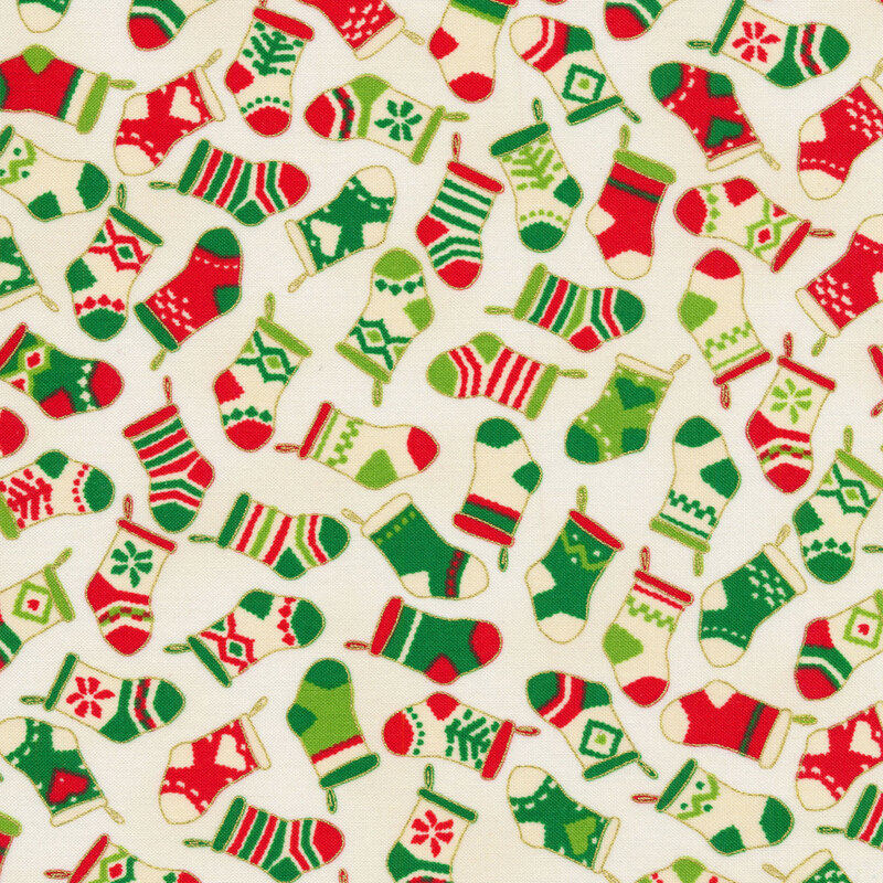 Cream fabric with tossed red, cream, and green Christmas stockings with gold metallic accents