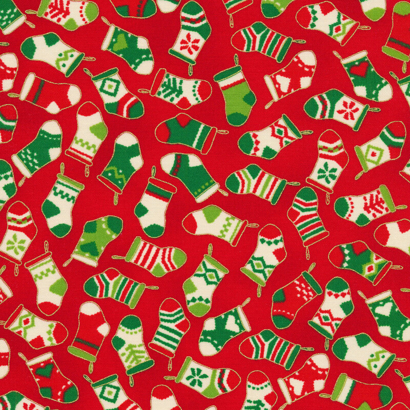 Red fabric with tossed red, cream, and green Christmas stockings with gold metallic accents
