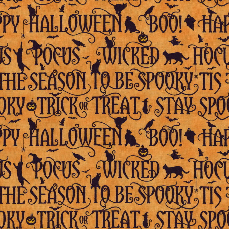 fabric featuring black halloween phrases on a light orange background with metallic accents