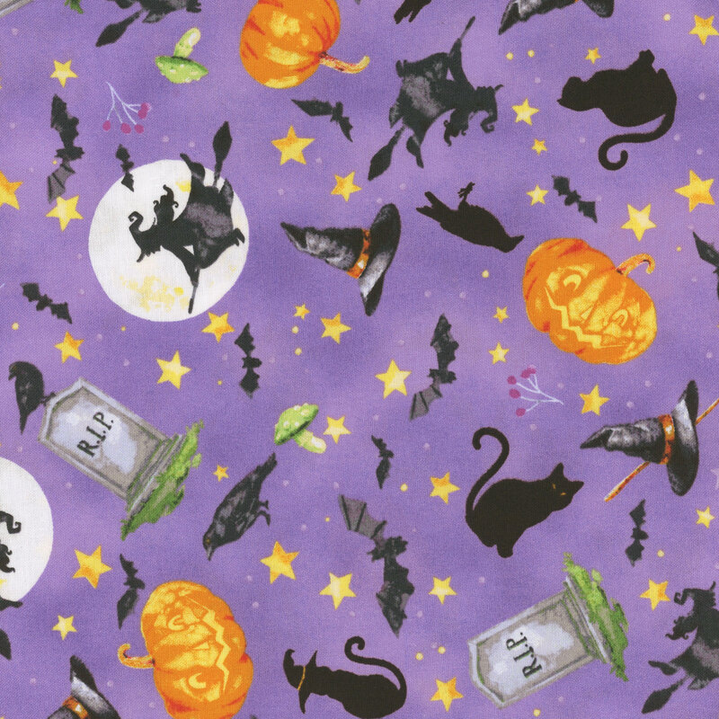 fabric featuring cats, crows, bats and pumpkins on a purple background with golden stars