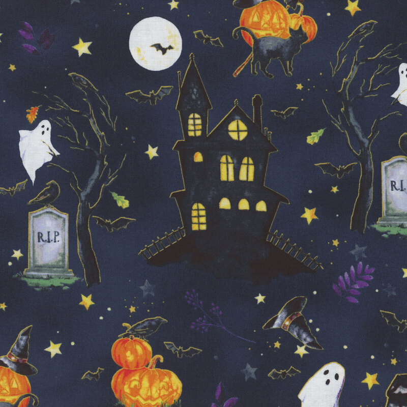 fabric featuring haunted houses, witches and ghosts on a navy blue background