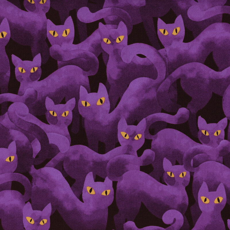 fabric featuring dark purple cats with orange eyes with black background
