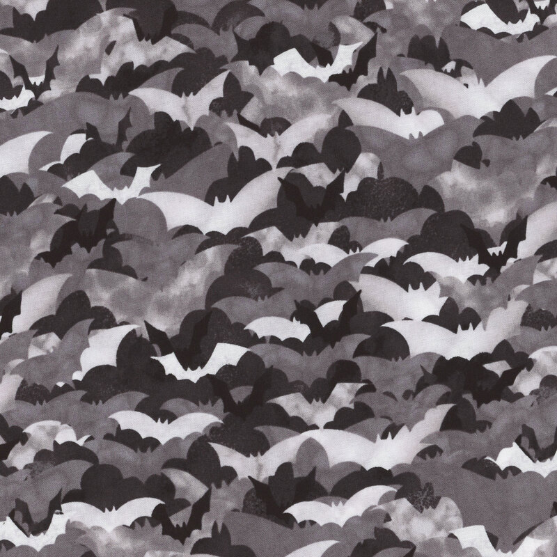 fabric with layered gray spooky bats on a black background
