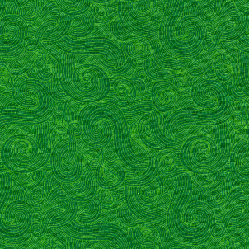 Tonal green fabric with dark swirls on a lighter background 