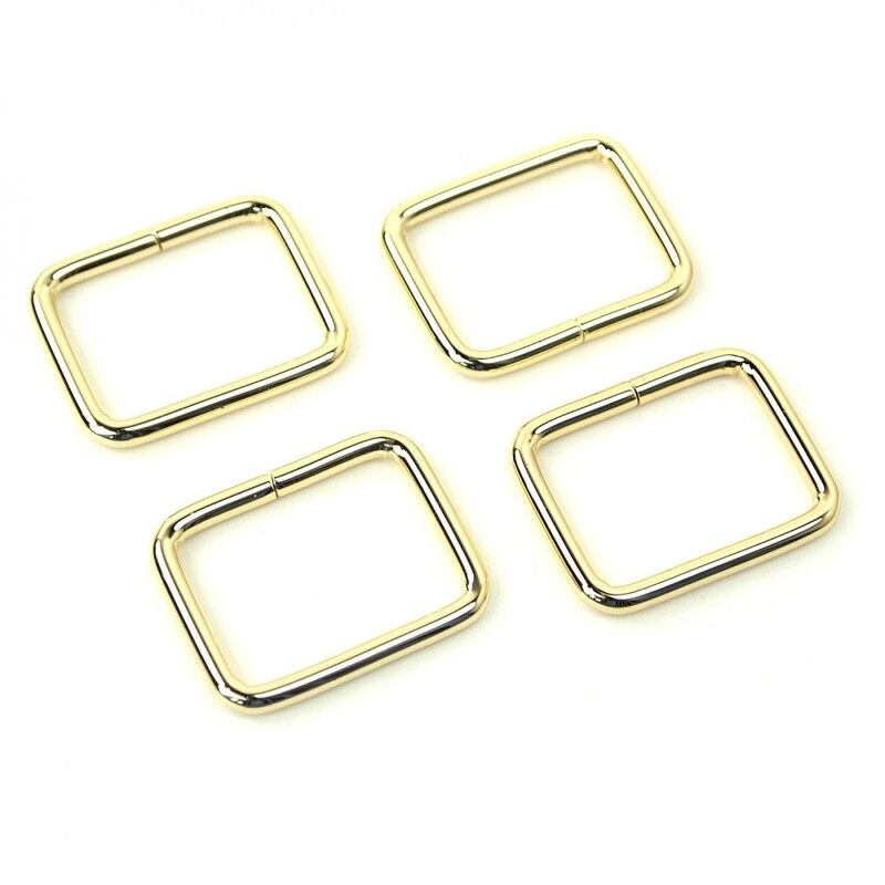 A pack of 4 metal rings in the Sallie Tomato 1