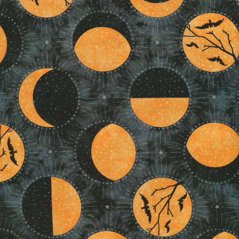 Dark charcoal fabric with large black and orange circles with different phases of the moon