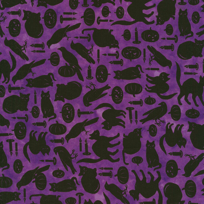 Purple fabric with black cats, ravens and jack-o-lanterns