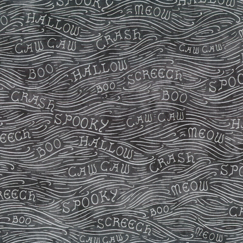 Mottled gray fabric with light gray waves and words