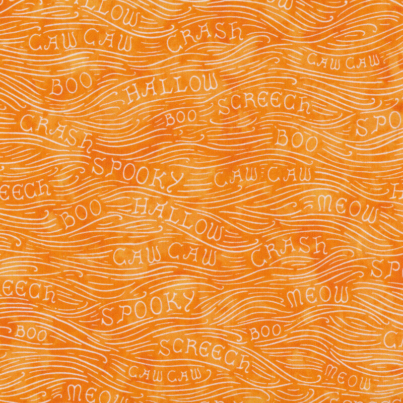 Mottled orange fabric with white waves and words