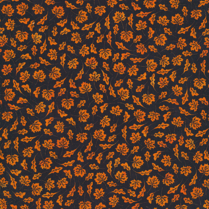 Black fabric with tossed bright orange leaves