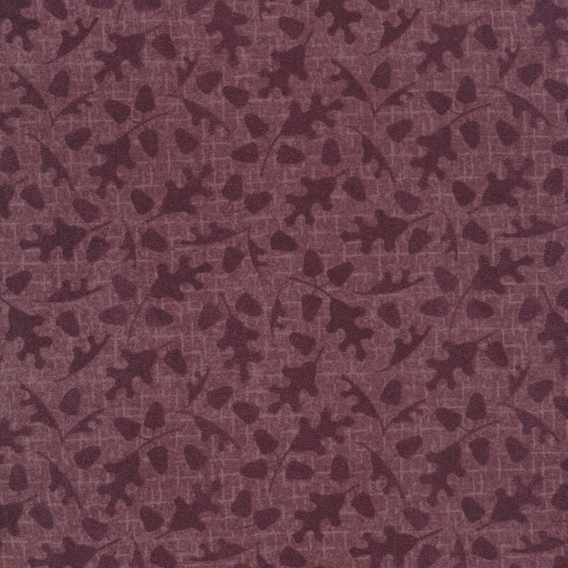 tonal purple fabric with fall leaves and acorns on a purple background