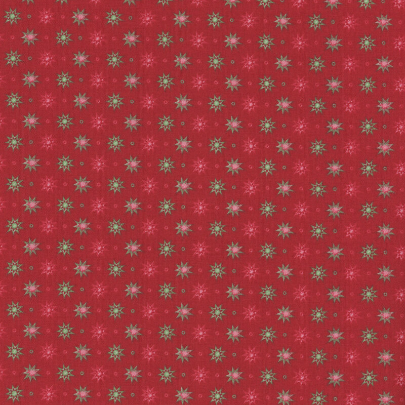 red and green abstract pointy stars on a solid red background