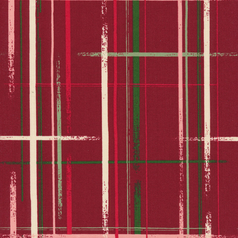 Dark red fabric with a distressed green, white, and light pink plaid design