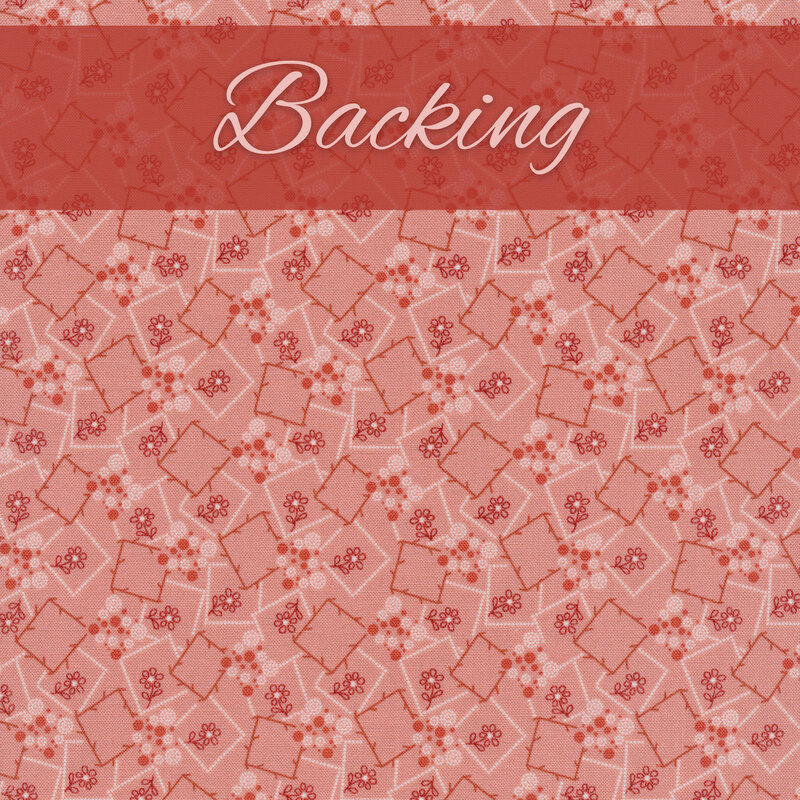 Pink fabric with red and white square outlines tossed all over with small red daisies and dots.