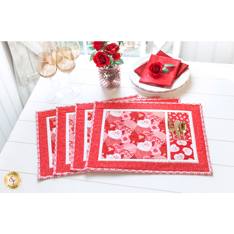 Be Mine Placemats on a white table.