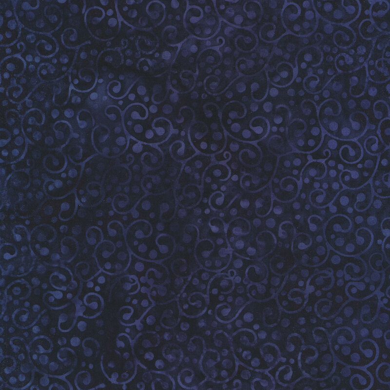 Dark blue mottled fabric with tonal blue swirls and dots all over