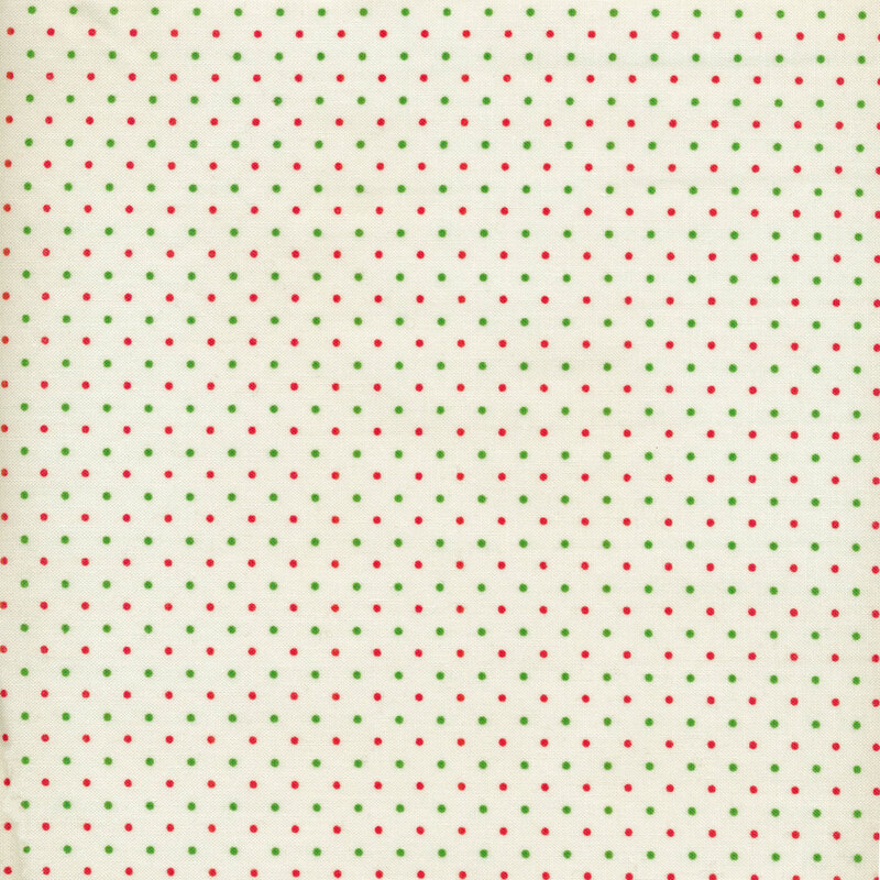 This Moda fabric features an off white background with alternating red and green dots