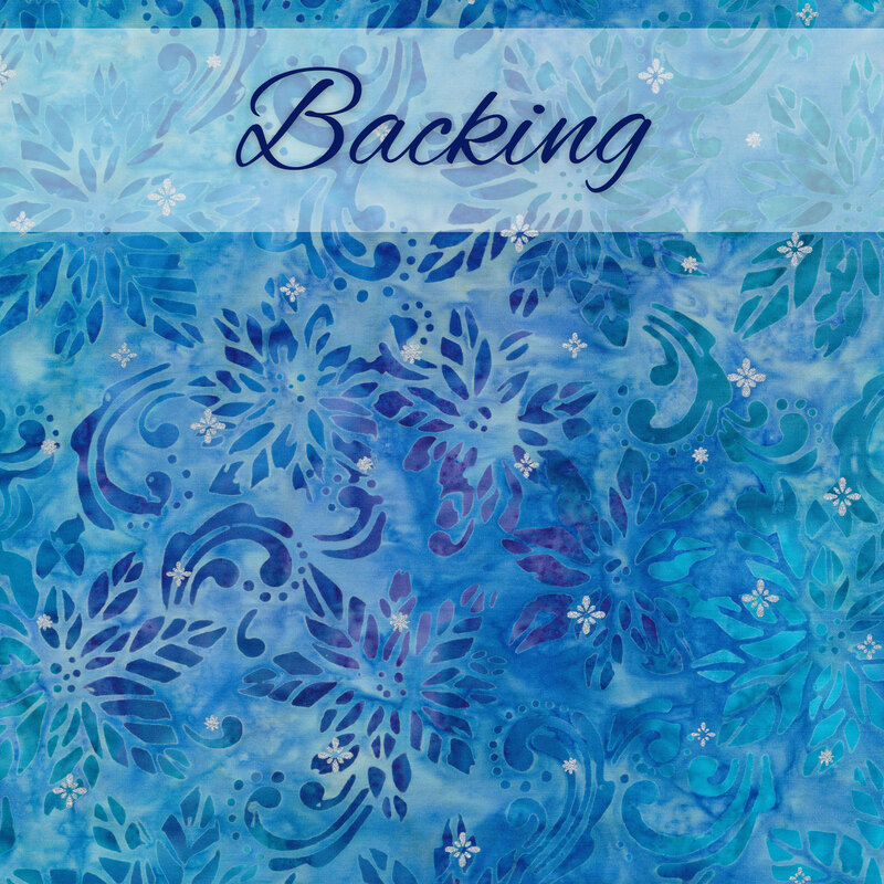 Medium blue mottled batik with snowflakes metallic silver starbursts with a pale banner and the word 