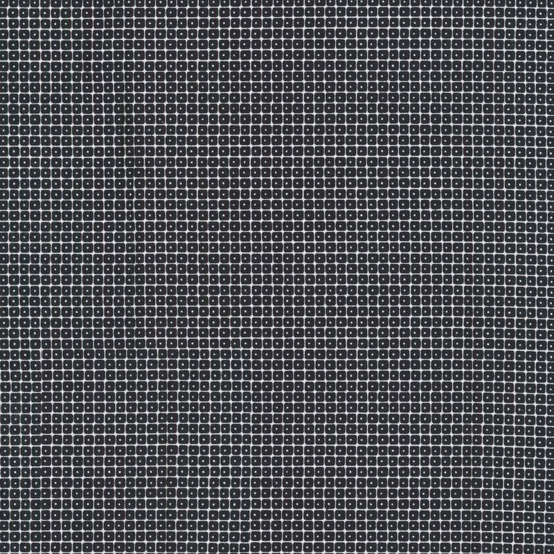 fabric featuring grids of small black squares with white spots in them