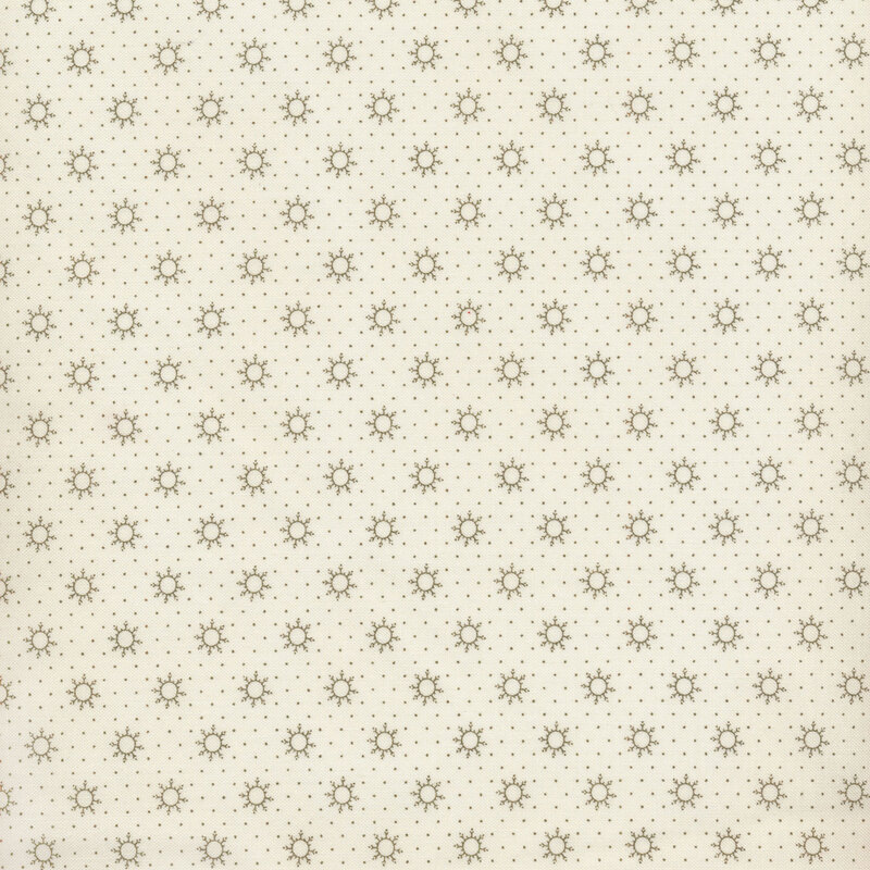 green dots and snowflakes on a cream background