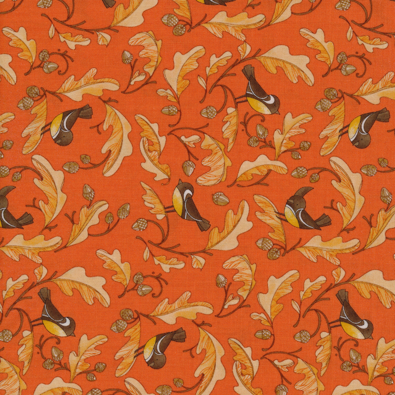 Bright orange fabric with light orange leaves, acorns, and small black and yellow birds on it