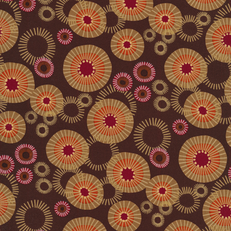 Dark brown fabric with abstract red, orange, tan and pink circles of varying sizes