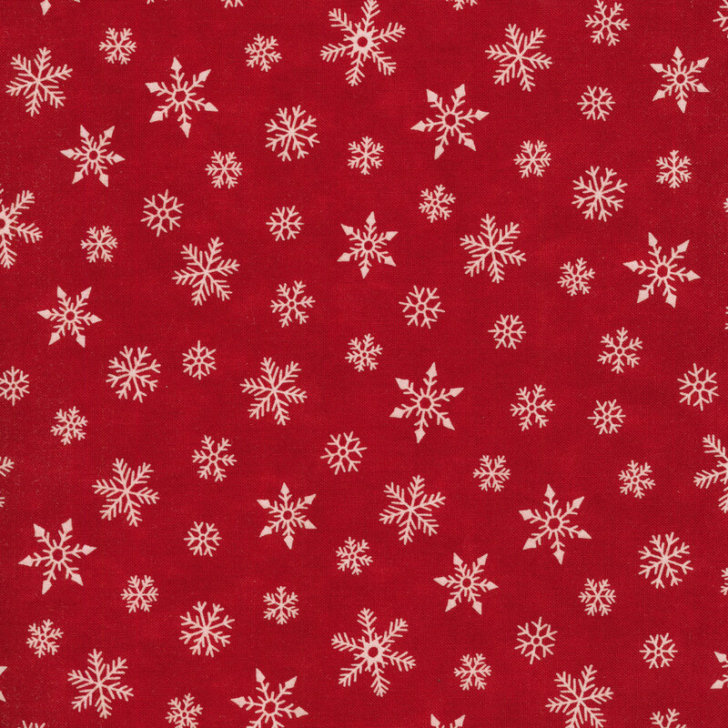 white tossed snowflakes on a bold red background