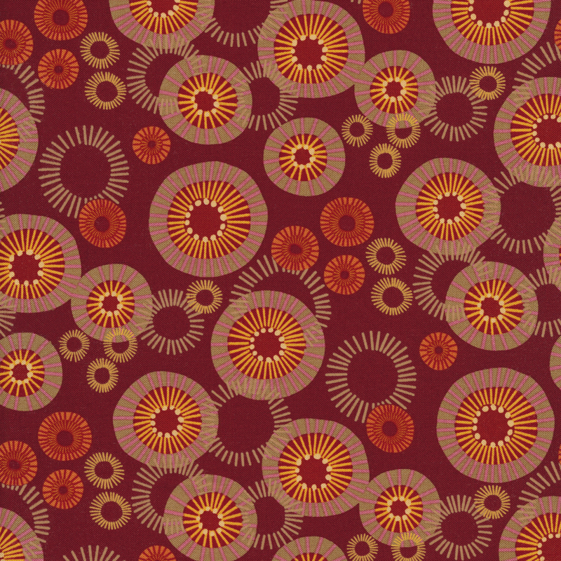Bright fuchsia fabric with abstract orange, red, and pink circles of varying sizes