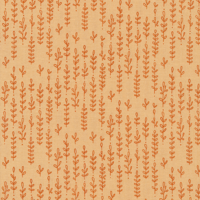 Tan fabric with a darker tonal plant pattern