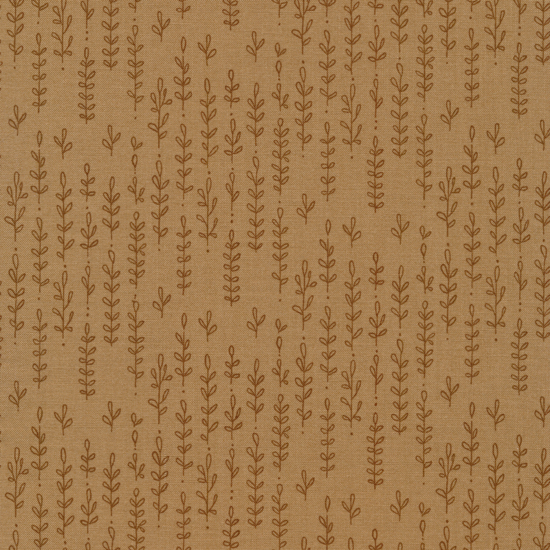 Brown fabric with a darker tonal plant pattern